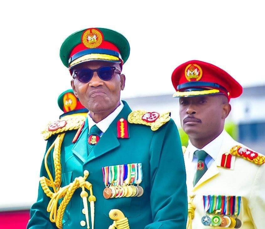 PHOTOS: Buhari storms army parade in military uniform