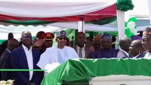 Buhari at the commissioning of the Zuba housing estate